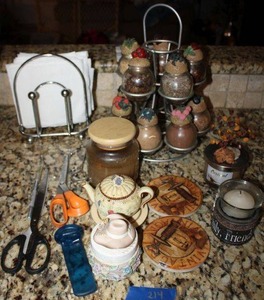 lot 214 image: Spice rack, ceramic teapot timer, candles and more