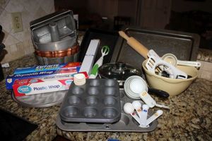 lot 218 image: Baking pans, poached egg pan, battery powered whisk, and more