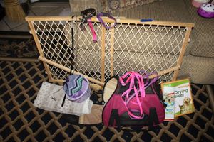 lot 243 image: Small dog carrier, sweaters, leashes, shampoo, and gate