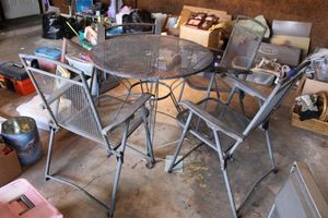 lot 295 image: Vintage wrought iron patio table and chairs