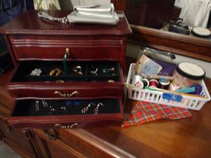 lot 90 image: Jewelry box with fashion jewelry plus phone wallet, sewing items