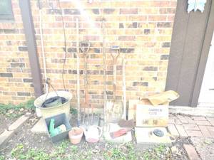 lot 317 image: Garden tools and planters plus yard bags