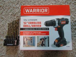 lot 331 image: Warrior 38 cordless drill like new in box with bit set