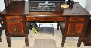 lot 91 image: Ashley Homestore Wooden Desk, 1 leg needs reattached
