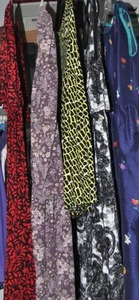 lot 115 image: Clothses Four Medium Dresses and One Skirt, Laura Ashley, and Go Softly Patio, and others