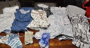 lot 119 image: Clothes Size Small Pajamas and Socks, Four Sets (Top and Bottom) Some Tops are Long Sleeve, Some are Sleeveless, Some Sets are include Pants, Some are Shorts, and A Few Separate Pieces. All Had Very Little Wear and Are Very Soft. Eddie Bauer and More