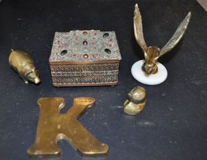 lot 34 image: Brass Eagle Paperweight, Solid Brass Duck and Pig Paperweight, Letter K and Spelter wood lined Trinket Box
