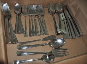 lot 36 image: Cuisinart Sixty-Five Piece flatware Set
