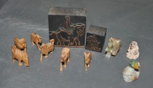 lot 49 image: Antique Copper Letterpress Printing Block, Miniature Vintage Onyx Elephant, and Several Hand Carved Miniature Olive Wood Animals