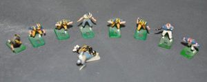 lot 51 image: Vintage Football player Figures from Tudor electric football game
