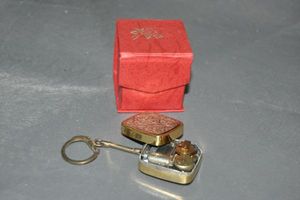 lot 54 image: Vintage Music Box Keychain