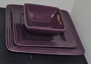 lot 58 image: Purple Square Dinner Plate, Salad Plate, and Bowl Laurie Gates