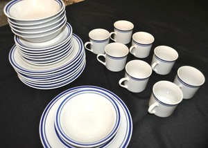 lot 74 image: Gibson dishes 8 Dinner Plates, Salad Plates, 6 Bowls, 2 with small chips and 8 Mugs