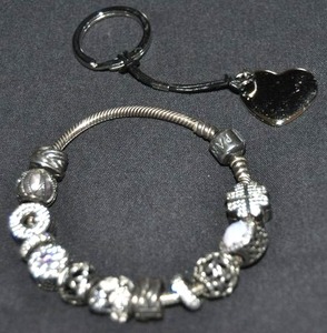 lot 10 image: Jewelry Authentic Pandora Bracelet with Charms