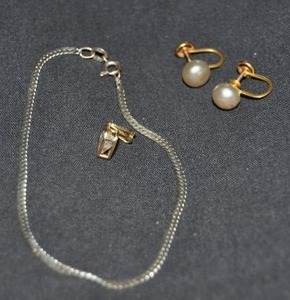 lot 7 image: Jewelry Bracelet, Stamped 14Kt Italy and Pendant with Clear Stone Marked 14K, Pearl like Screw Back Earrings, Marked 10K