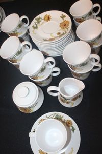 lot 89 image: Dishes Noritake Progression China Aloha 9023, Seven Cup and Saucer Sets, Extra Saucers, Creamer and Sugar