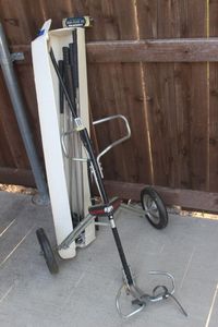 lot 179 image: Golf Caddy and Left Handed Clubs,appear Unused