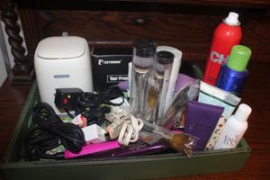 lot 195 image: Health and Beautity Items and small trash can