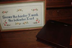 lot 205 image: Framed Cross Stitch and Vallet Box