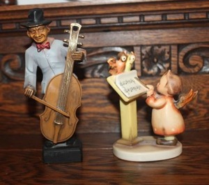 lot 216 image: Vintage West Germany Resin Hobo Figurine playing Cello and Vintage Hummel  Duet with Birdie