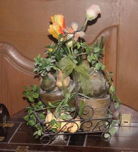 lot 301 image: Decorative Tabletop Arrangement, in Metal Basket, Will need a light Cleaning.