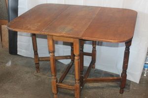 lot 303 image: Vintique Gait legged Table as shown