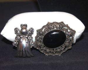 lot 254 image: Vintage Angel Pin and Broach both stamped 925