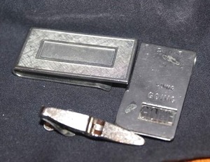 lot 263 image: Two Silver Toned Money Clips and Tie Clip