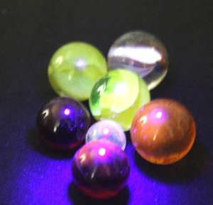 lot 250 image: Vintage UV Reactive marbles