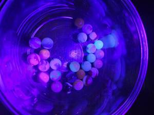 lot 372 image: Vintage uranium oxide marbles, verified with UV Light