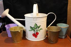 lot 23 image: Metal water can and garden buckets
