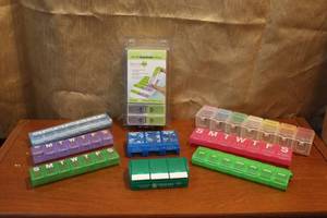lot 34 image: Weekly pill boxs