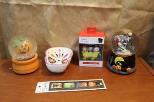 lot 35 image: Nightmare before Christmas snow globe pumpkin snow globe sugar skull candy dish and more see photos