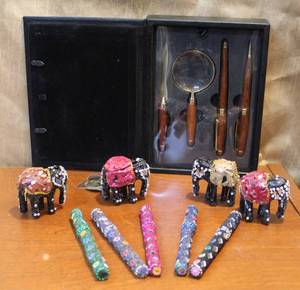 lot 60 image: Fountain pen and little elephants and decorative pins and more see photo