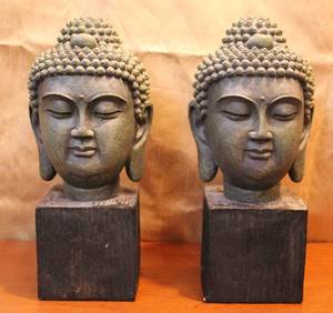 lot 68 image: Buddha head bookends