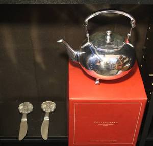 lot 93 image: Silver teapot and silver butter knife
