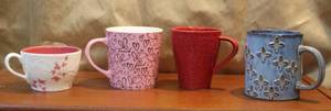 lot 119 image: 4 Starbucks coffee cups