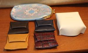 lot 142 image: Case made in Italy and small little change purses made in Italy