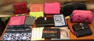 lot 145 image: Mix lot of brands like coach and more see photo