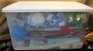 lot 197 image: Tote full gift wrapping supplies for multiple occasions gift bags and ribbon and more
