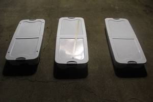 lot 205 image: Three under the bed totes one with Wheels