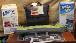 lot 221 image: Ziploc space saver bags and 20 duffel bag and more