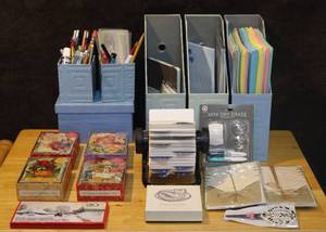lot 253 image: Mixed lot of stationery boxes with colored paper pencils cards address roller cat paperweight and much more see photo