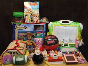 lot 296 image: Tote full of random toys see pictures