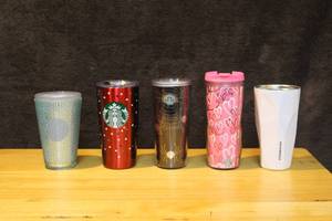 lot 306 image: Lot of Starbucks cups