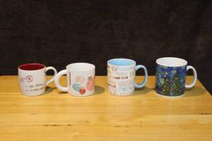 lot 311 image: Lot of Starbucks cups