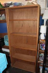 lot 321 image: Wood shelf about 6 ft tall (pic. used 3x all look the same)