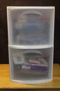 lot 323 image: Two drawer container with office supplies paper and more see photos