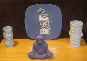 lot 364 image: Two tiki cups a tiki plate and a sphinxcat
