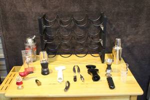 lot 382 image: Three-tier metal wine rack and a mix of corks wine openers and more